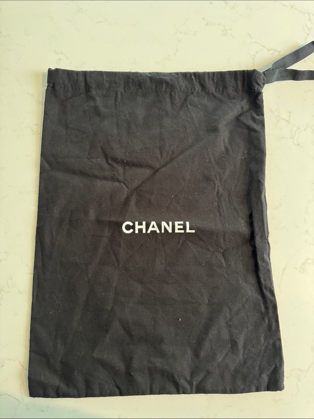 CHANEL Black Drawstring Dust Pouch with White Logo